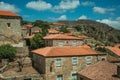 Rooftops of old houses and large wall Royalty Free Stock Photo