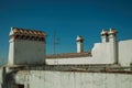 Rooftops with television antenna and chimneys Royalty Free Stock Photo