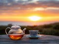 a Rooibos tea set against the backdrop of a South African sunset