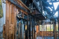 Room apartment after a fire charred wooden walls