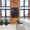 Room with big windows and brick walls Royalty Free Stock Photo