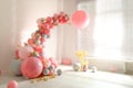Room decorated with balloons and spikelets for party