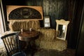 Western Room With Hay Bales And Clocks Royalty Free Stock Photo
