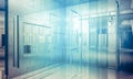 Room.Empty office with columns and large windows, Indoor building. business space with blue light effects Royalty Free Stock Photo