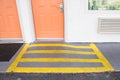 Room entrance with ramp for disabled person wheelchair Royalty Free Stock Photo