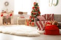 Room interior with Christmas tree and Santa`s bag Royalty Free Stock Photo