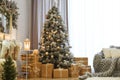 Room interior with decorated Christmas tree and gifts Royalty Free Stock Photo