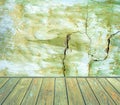 Room interior: green damaged cement wall with wooden floor Royalty Free Stock Photo