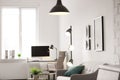 Room interior with modern lamps and sofa Royalty Free Stock Photo