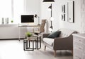 Room interior with modern lamps and sofa Royalty Free Stock Photo