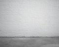 Room interior with white brick wall and concrete floor Royalty Free Stock Photo