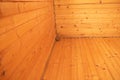 A room made of wood and a wooden corner from the ceiling and wall, wooden decor in the apartment