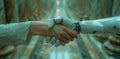 A man and a robot are sharing a gesture, shaking hands in a room Royalty Free Stock Photo