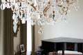 Room In Modern House With Chandelier And Grand Piano Royalty Free Stock Photo