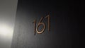 Room number 161. Door number in apartment house or hotel room