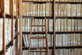 Room with old archive of documents and historical charts