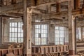 Interior warehouse room with old windows