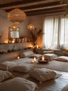 A room with a rug and pillows, lit with candles and lamps