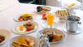 Room service - breakfast in bed in hotel, morning food Royalty Free Stock Photo