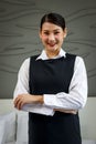 Room service maid cleaning and making bed hotel room concept, portrait of young beautiful Asian smiling female  standing with Royalty Free Stock Photo