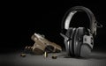 Room for test with electronic hearing protection and gun Royalty Free Stock Photo