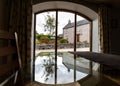 Room with a view old cottage seen through window in countryside Royalty Free Stock Photo