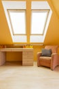 Room in warm colours with desk