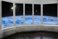 Room window with view to space above Earth`s atmosphere Moon comet and starry cosmos