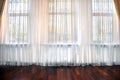 Room window with white, yellow and orange curtains Royalty Free Stock Photo