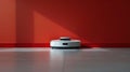 Roomba Resting in Front of Red Wall