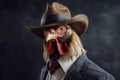 Rooster gentleman in a suit, tie, hat and glasses on a black background. AI generated. Royalty Free Stock Photo