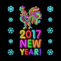 The rooster new year greeting card design template. 2017 new year calendar symbol or rooster, glowing neon light on dark. Royalty Free Stock Photo