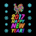 The rooster new year greeting card design template. 2017 new year calendar symbol or rooster, glowing neon light on dark. Royalty Free Stock Photo