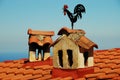 Rooster on the roof, Greece