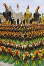 Rooster statuettes at the monument to the King Naresuan the Great in Suphan Buri, Thailand.