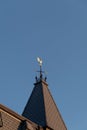 Rooster Windvane on Conical Roof Royalty Free Stock Photo