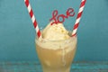 Root beer float with striped straws Royalty Free Stock Photo