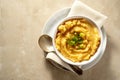 Root mash. Root vegetables mashed in a bowl. Garnished with oil and herbs. Royalty Free Stock Photo