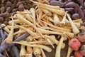 Root vegetables displayed together on a wooden table