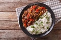 Ropa vieja: beef stew in tomato sauce with vegetables and rice.