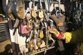 Rope access miner technician inspector hand inspecting safety check on descenders, locking carabiners hardware equipment