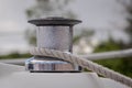 A Rope Around a Chrome Winch on a Yacht Royalty Free Stock Photo