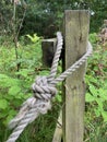 Rope around a country gatepost Royalty Free Stock Photo