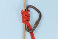 Rope Bachmann knot on a blue background