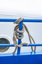 Rope on a blue reling Royalty Free Stock Photo