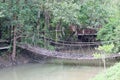 Rope bridge across river Royalty Free Stock Photo