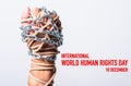 Rope and chain on fist hand with international world HUMAN RIGHTS DAY 10 december text Royalty Free Stock Photo