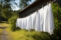 Rope clothes line laundry clean summer dry clothesline white cotton Royalty Free Stock Photo