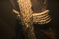 Rope rope coiled on a wooden pillar Royalty Free Stock Photo