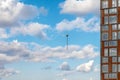 The rope of a construction cargo crane on a background of blue sky with clouds Royalty Free Stock Photo